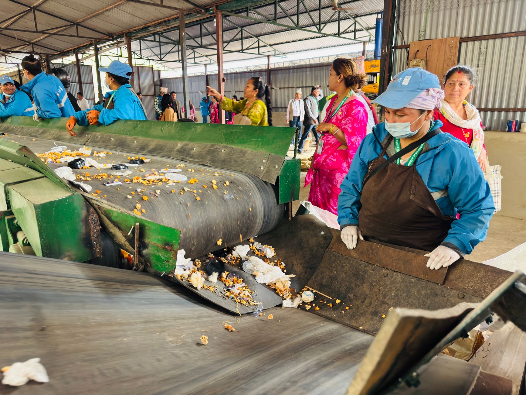 Materials recovery facility conveyor belt sorting mixed recycling — what happens to recycling UK