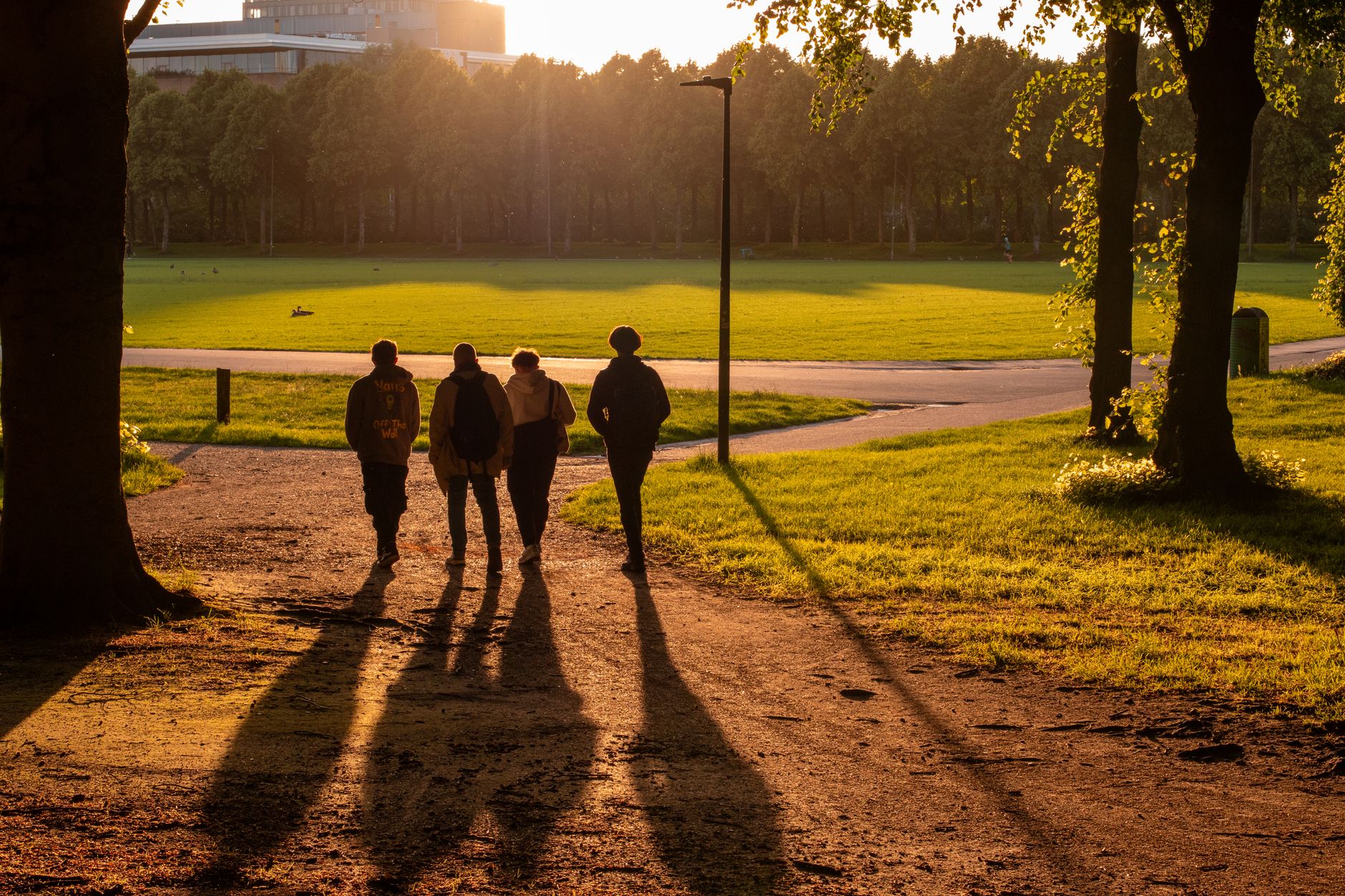 Community walking group in a local park, typical of social prescribing NHS UK referrals
