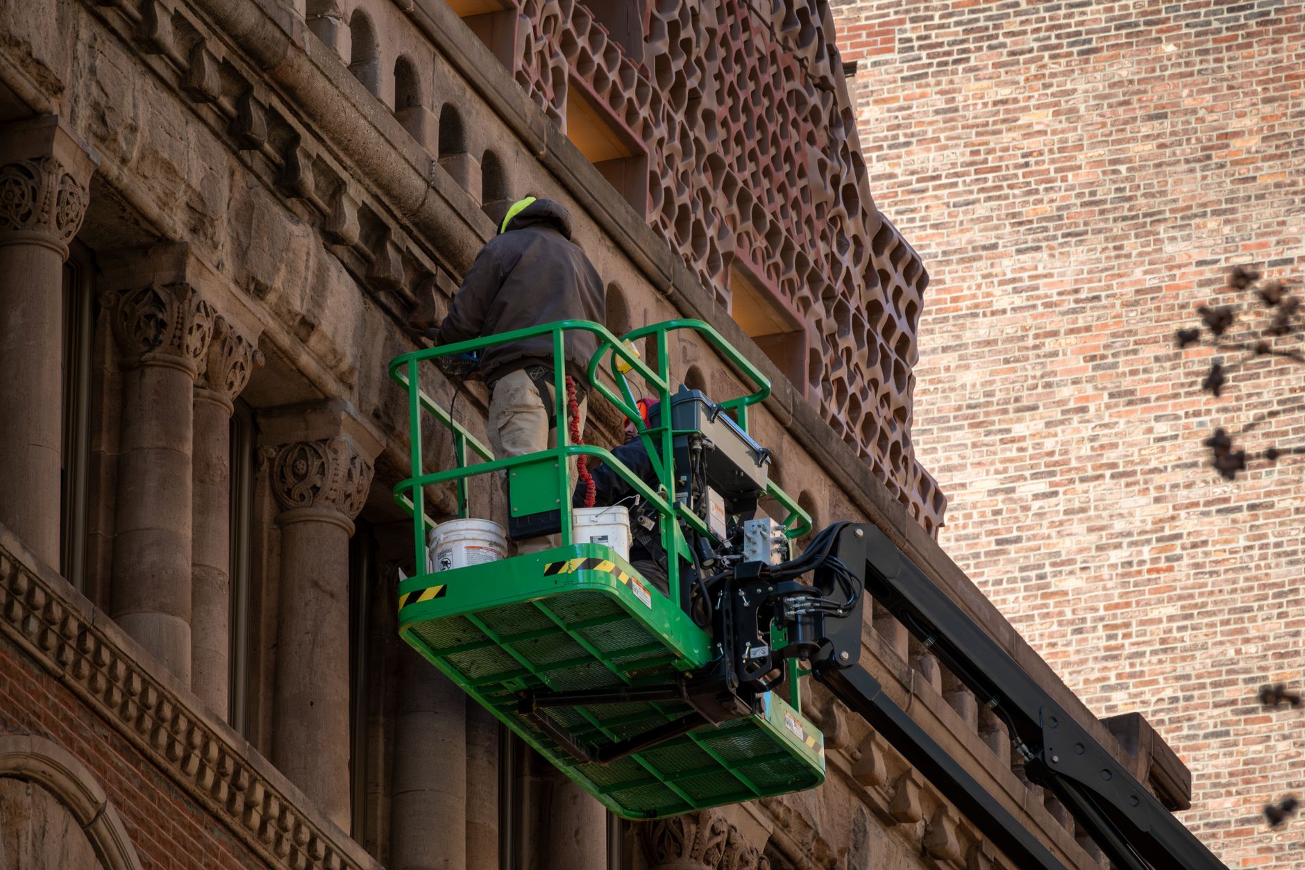 Close-up of crumbling masonry on a heritage at risk listed building in the UK being inspected