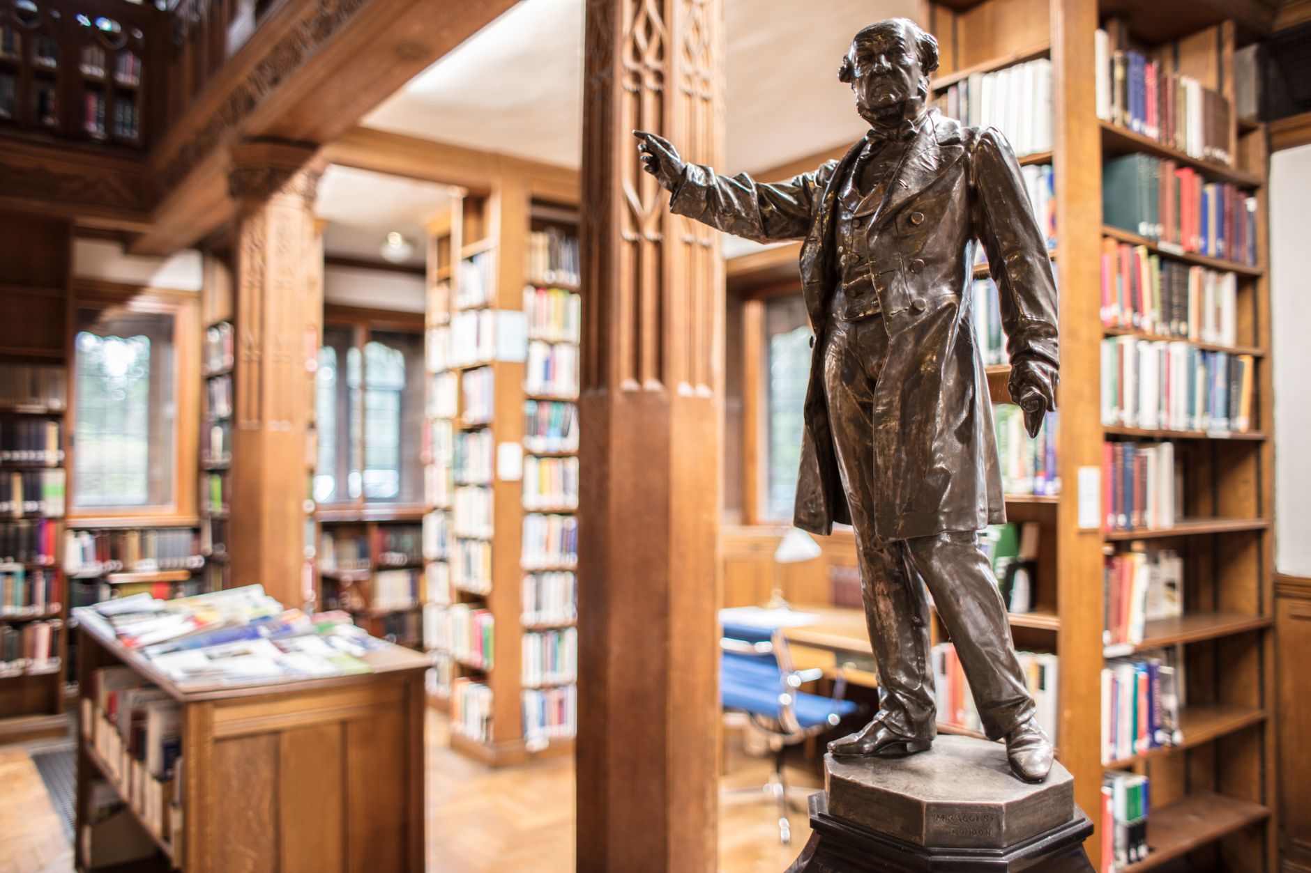 Interior of a public library reading room, showing the spaces at risk from UK library closures